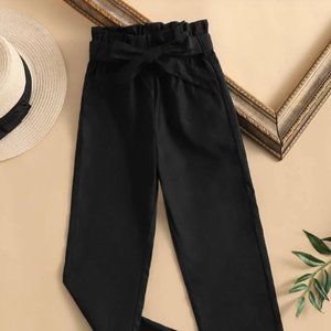 Black colored paper bag waisted pants
